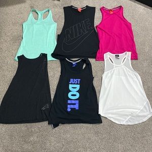 6 Nike Tanks